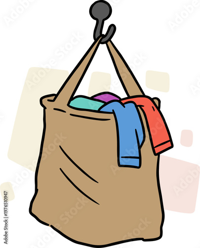 Illustration of a beige bag with colorful clothes hanging from a hook on a transparent background, depicting casual laundry and everyday items.