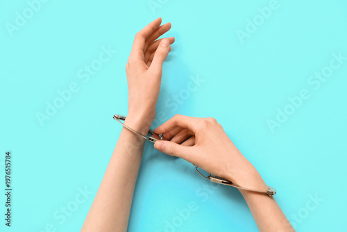Female hands with handcuffs...