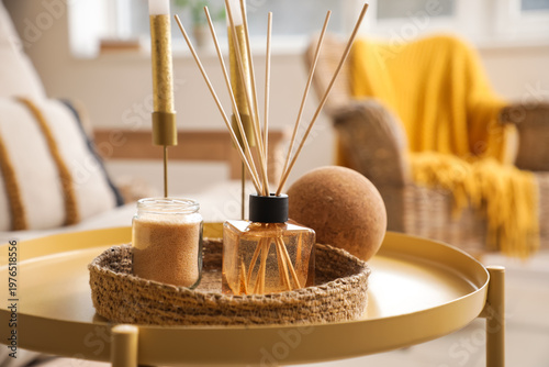 Reed diffuser on table in l...