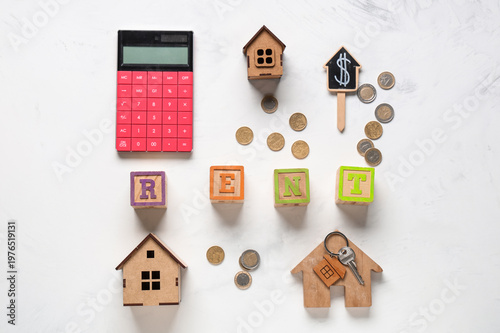 Toy houses with word RENT, ...