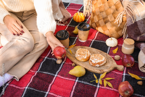 Young woman with cups of co...