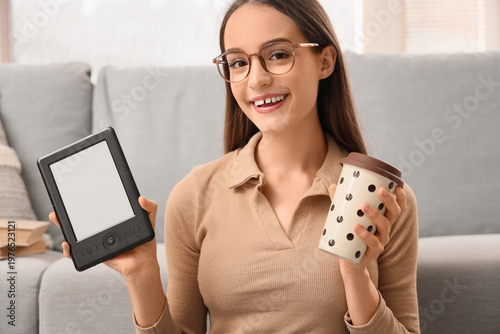 Young girl with e-reader an...