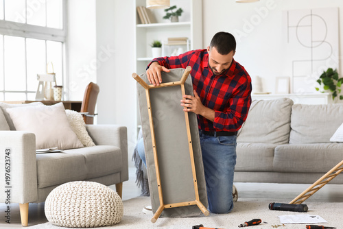 Young man assembling soft b...