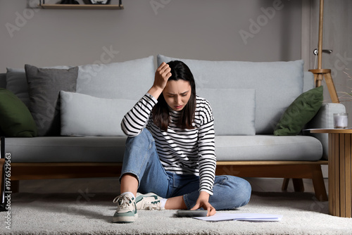 Depressed young woman with ...