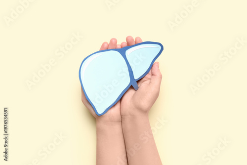 Female hands with paper liv...