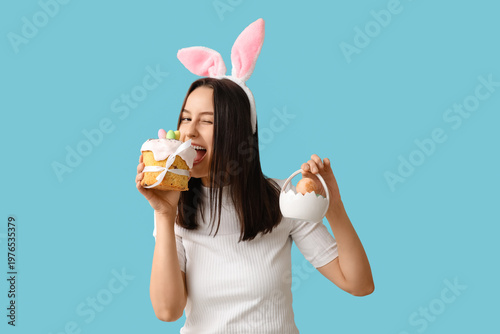 Pretty young woman with bun...