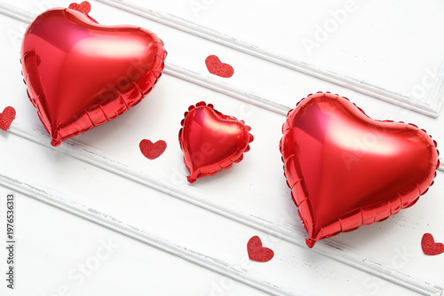 Heart shaped air balloons on white background. Valentine's day celebration