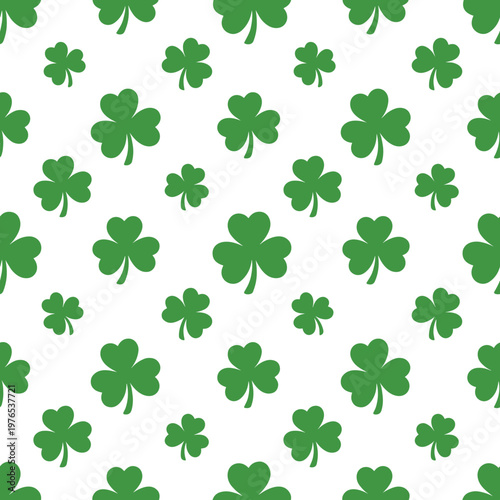 Green shamrock pattern on white, seamless vector illustration