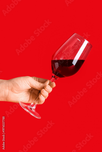 Female hand with glass of w...
