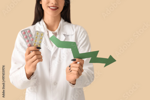 Female doctor with arrow an...