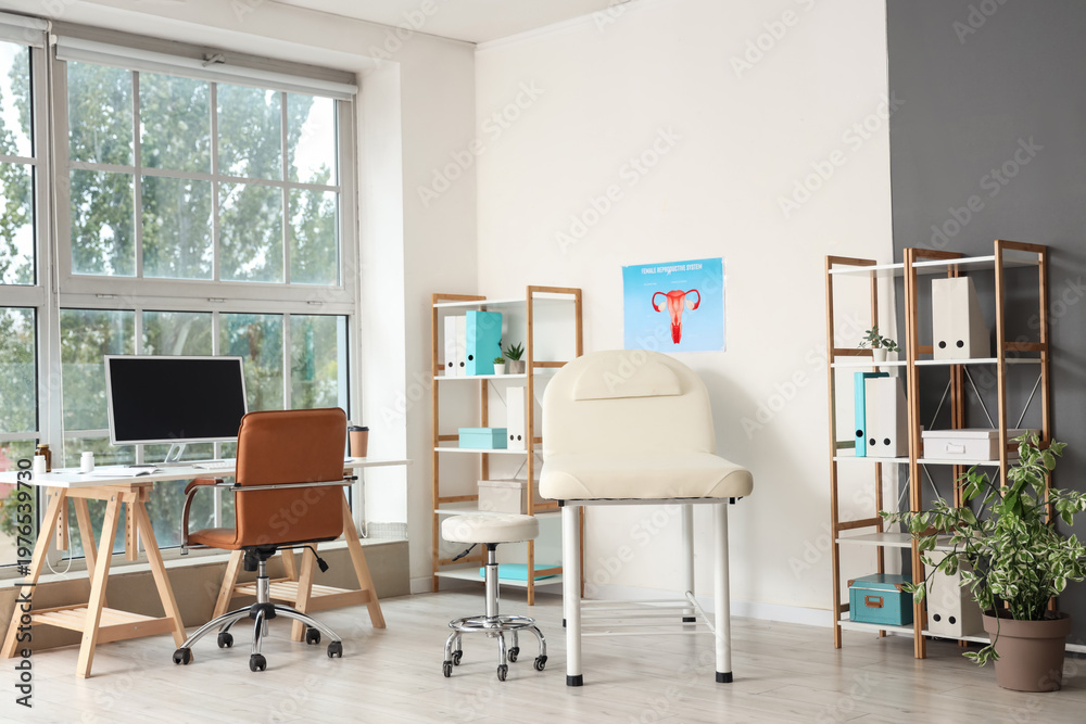 Fototapeta premium Interior of gynecologist's office with workplace and couch