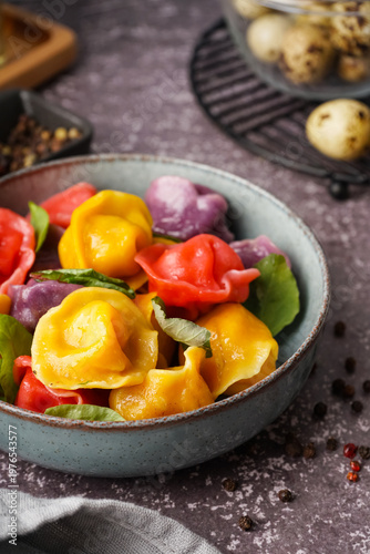Bowl of boiled colorful dum...