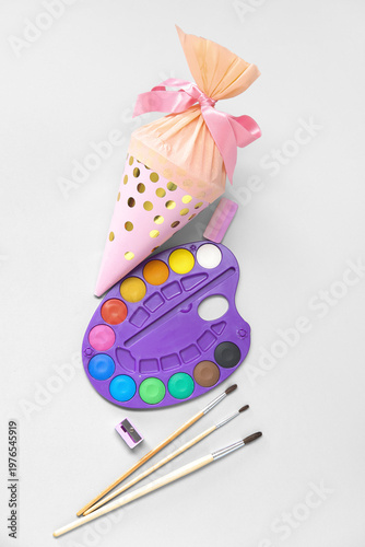 Pink school cone with diffe...