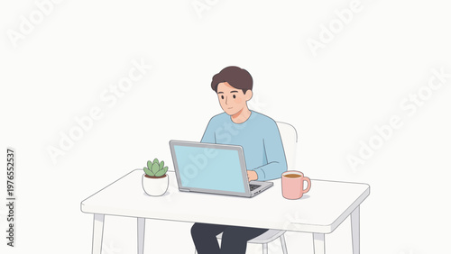Person working on laptop at desk