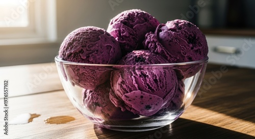 Delicious Homemade Blueberry Ice Cream in a Glass Bowl.