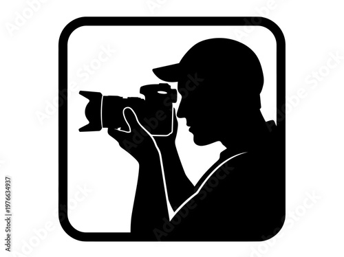 Silhouette of a photographer with a camera, capturing a moment in time