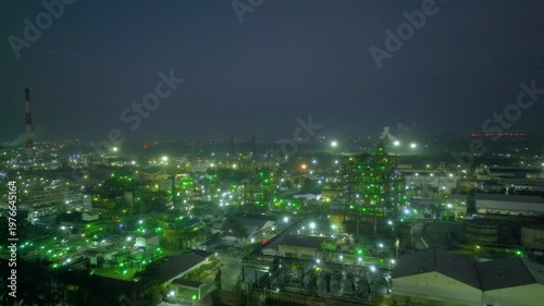 Aerial night view of Grasim industrial plant with illuminated factory lights in Nagda, India