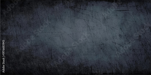 A dark blue and black vintage grunge background features a rough aged concrete wall texture with blank space for a dirty paper or chalkboard design backdrop