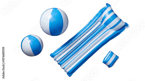 A photograph of two beach balls and a blue and white inflatable mattress, ready for summer fun.