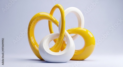 A modern sculpture with yellow and white rings on a gray background