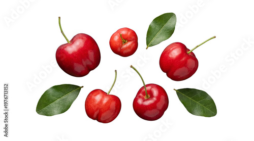 Obraz na plátně Top-down view of vibrant, fresh acerola cherries and scattered green leaves, isolated on a transparent background
