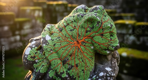 Vibrant Green Lichen Patterns on Ancient Stone Sculpture