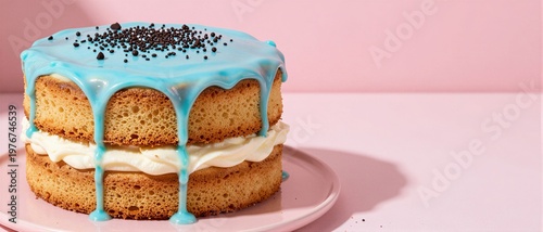 Layered drip cake with blue icing and cream filling on pink background, celebration and bakery marketing concept