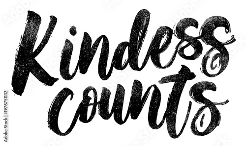 "Kindness counts" hand-lettered inspirational quote in black brush calligraphy style isolated on a white background for motivational design.