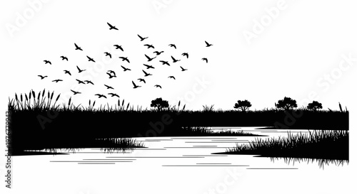 A flock of birds flies over a marshland landscape in black and white