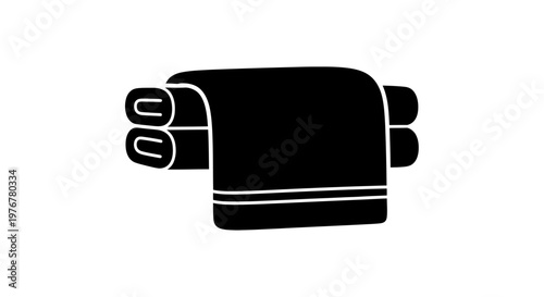 Black and white illustration of neatly folded towels stacked together