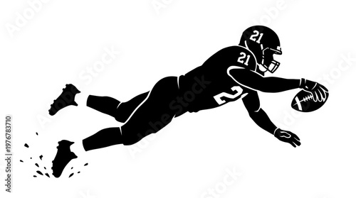 A black silhouette of an American football player diving with the ball, scoring a touchdown.