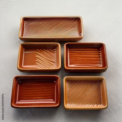 Set of rectangular ceramic dishes with textured surfaces