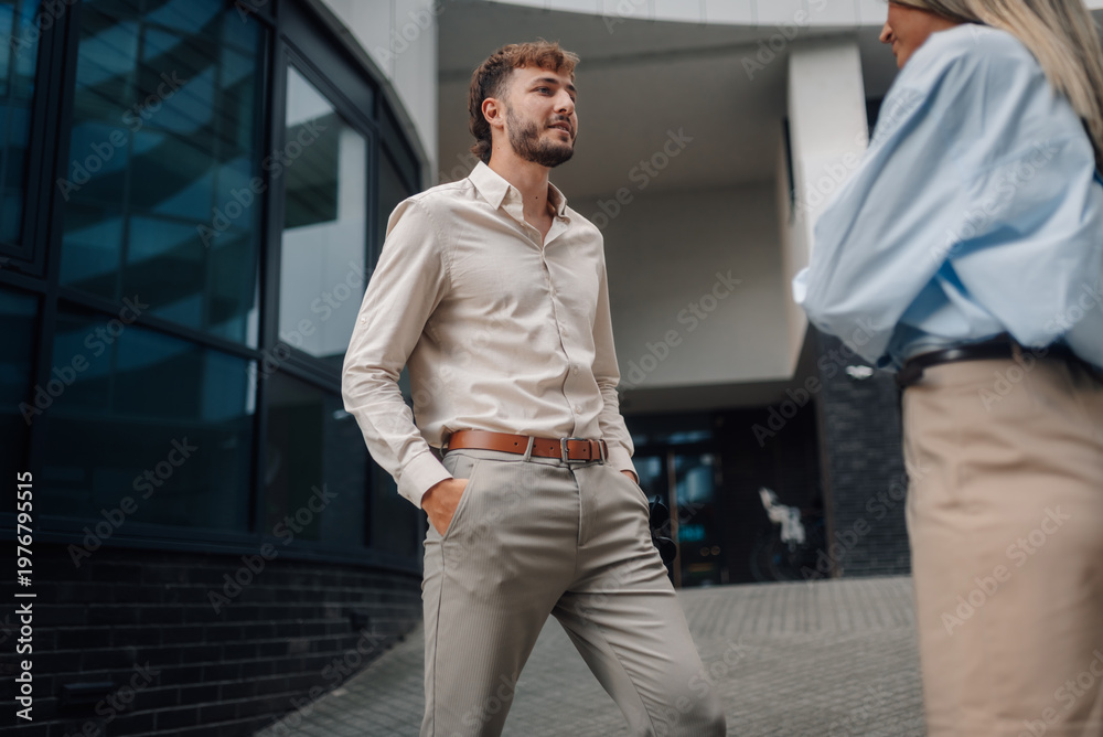 Fototapeta premium Business partners having conversation outside office building