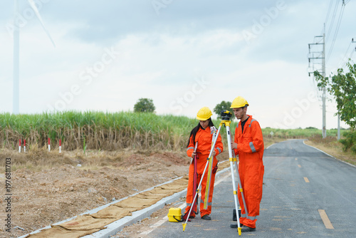 Принти на полотні Civil engineers are inspecting the completeness of the road construction at the wind farm