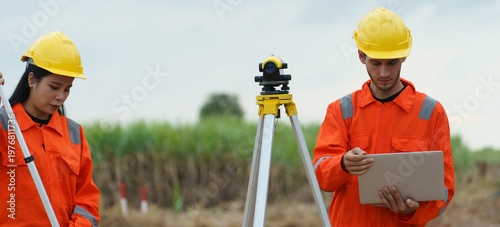 Civil engineers are inspecting the completeness of the road construction at the wind farm.