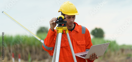 Civil engineers are inspecting the completeness of the road construction at the wind farm.