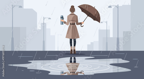 A lone woman holding an umbrella and a thermos stands in the rain, reflected in a puddle on a city street