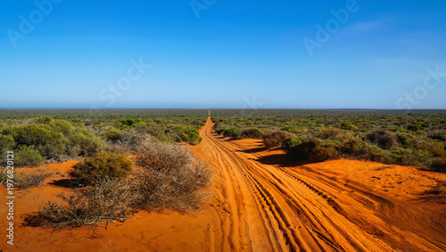 Francois Peron National Park, located on a remote peninsula in Western Australia's Shark Bay World Heritage Area red dirt road through arid scrubland