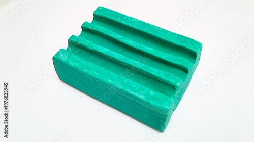 Green Dishwashing Soap Bar Rotating on White Background, Green Soap Rotating Isolated, Stock Footage