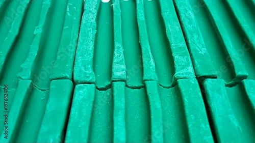 Green Dishwashing Soap Bars Moving in a Line, White Background Stock Footage