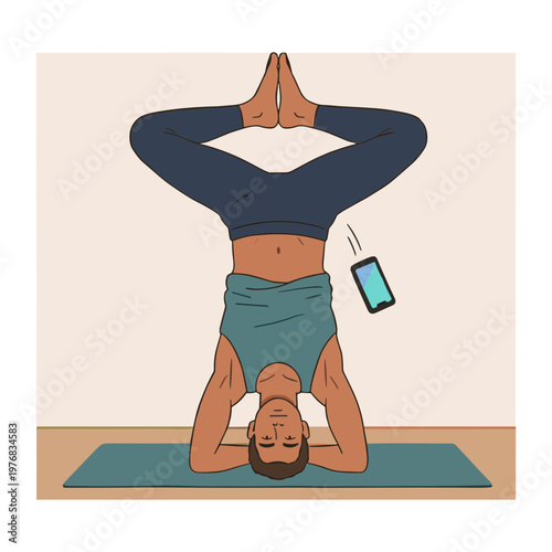 Woman practices inverted yoga pose on mat with phone nearby.