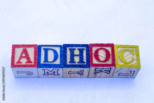 The term adhoc displayed visually on a clear background with copy space