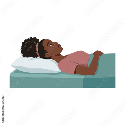 A woman lies on a bed with her head on a pillow looking up.