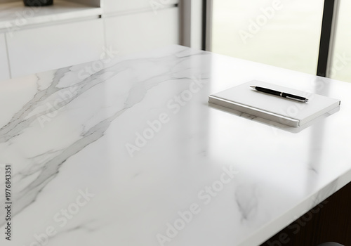 A white marble kitchen counter top with a built-in induction cooktop