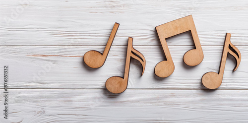Wooden Music Notes on White Background – Musical Symbol and Artistic Decor Concept