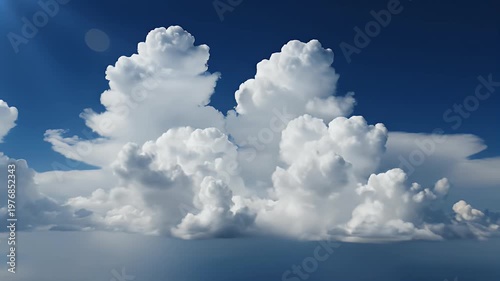 A serene and expansive view showcases a vibrant blue sky filled with fluffy white clouds hovering above a sea of mist, creating a peaceful and dreamlike atmosphere.