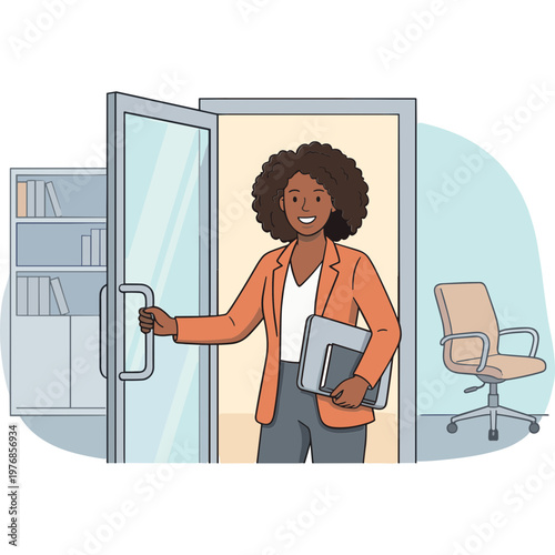 A smiling woman enters an office holding books and approaching a desk
