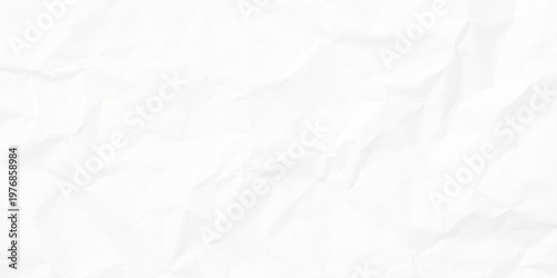 Crumpled white paper texture background with creases and folds
