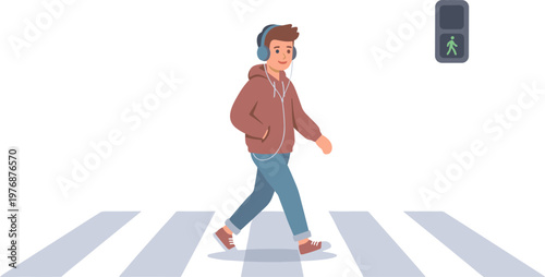 Man wearing headphones walks across a city street crossing