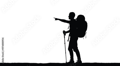 Silhouette of a hiker with a backpack pointing into the distance with trekking poles in hand standing